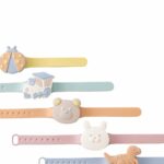 Six multicolored silicone wristbands with playful designs, including a ladybug, train, bear, rabbit, dinosaur, and abstract shape.