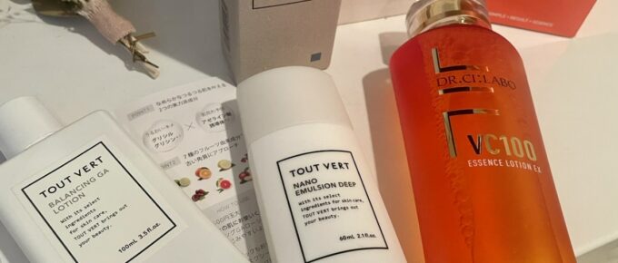 Skincare products on a table, showcasing the hottest Japanese skincare items, including two Tout Vert lotions and a Dr.Ci:Labo VC100 Essence Lotion.